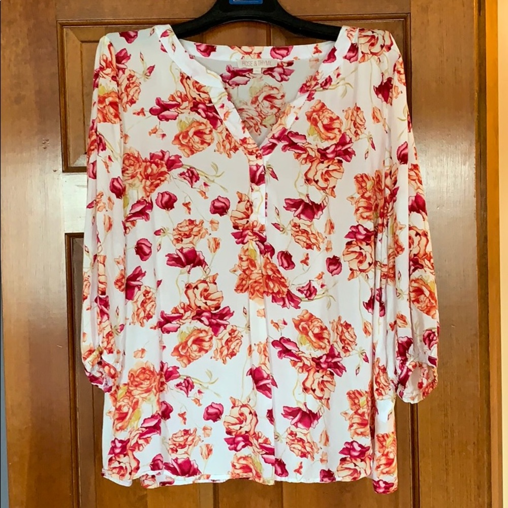 Blouse with roses.